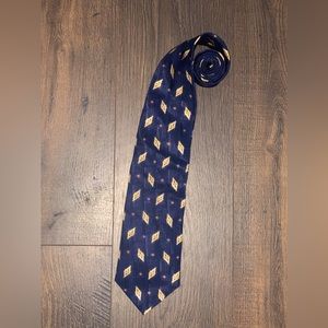 NWT Men’s Neck Tie by Monterey Bay/Jay Blades and Company. Blue and gold pattern